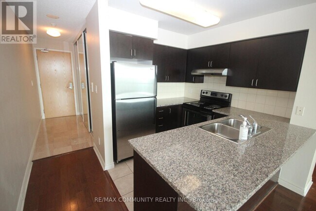 Photo du bâtiment - 88-1688 Grangeway Ave