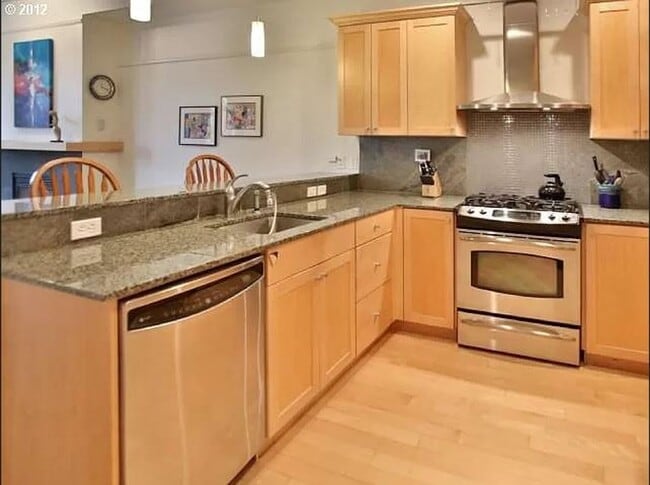 Building Photo - Spacious Beaumont Village Condo with Cover...