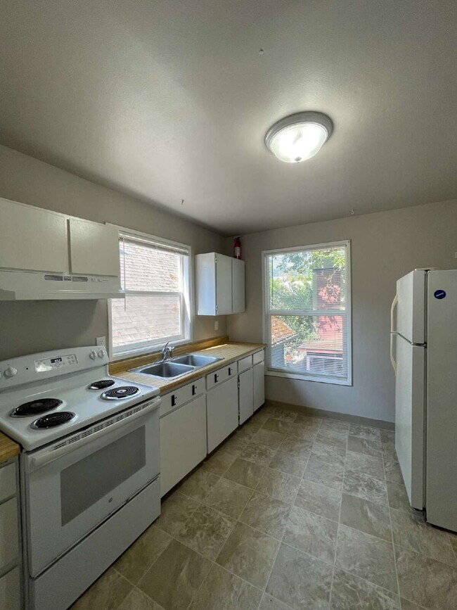 Photo - Spacious 3-Bedroom, 2-Bathroom Apartment with **Portable AC Unit Included** in NW Portland