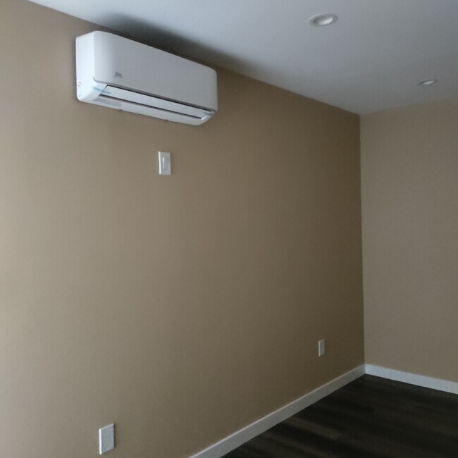 2 mini splits in bedroom and livingroom - 110 E 76th Pl