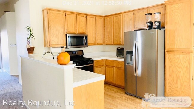 Building Photo - 3 br, 2 bath House - 8444 Water Poppy Way