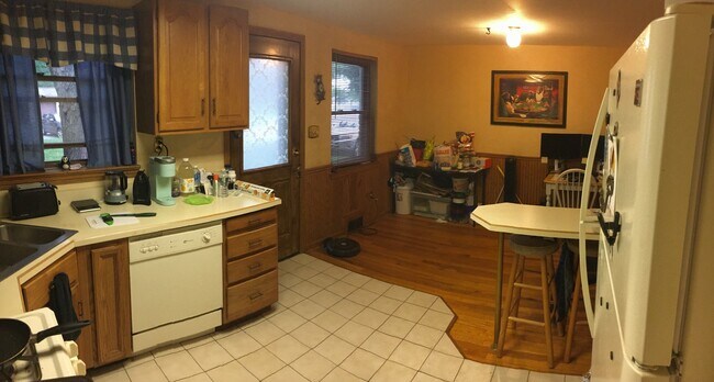 Back door, 2 windows to backyard. Breakfast nook has 3 stools - 189 Newman St