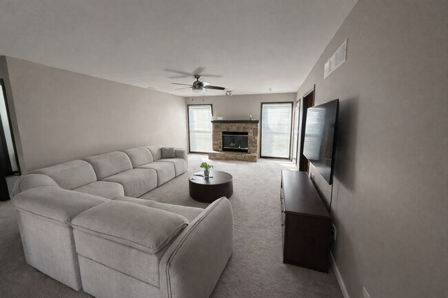 Building Photo - 4 Bed Lenexa Home w/ Finished Basement, Solar, 3 Car Garage and Fenced Yard!!