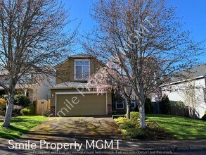 Building Photo - 5922 NW Snowlily Dr