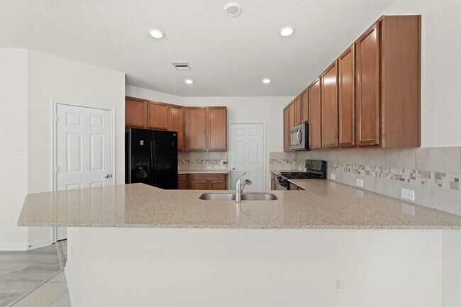 Foto del edificio - 4623 Orchard Garden Way