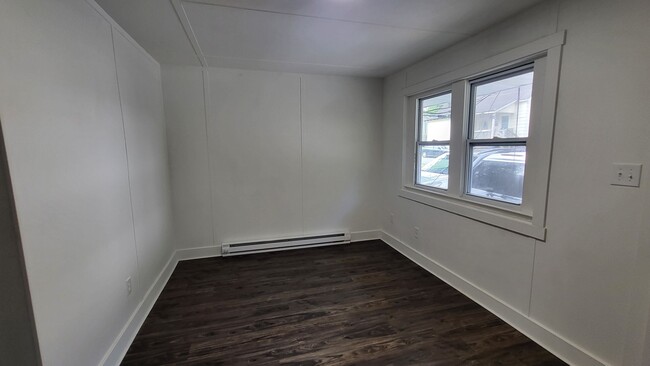 Building Photo - Two Bedroom duplex Available for Rent: One...