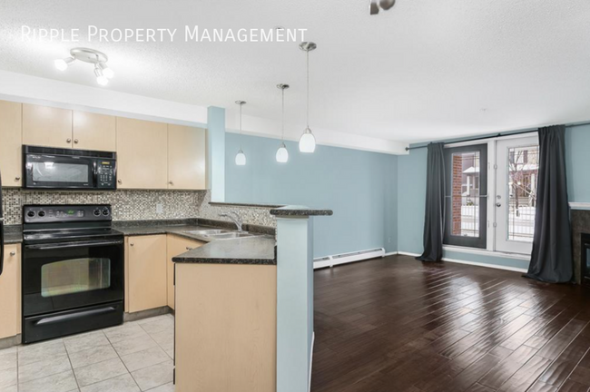 Photo du bâtiment - FANTASTIC 2 BEDS/ 1 BATHS CONDO