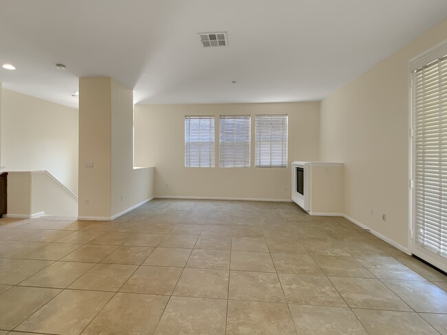 Building Photo - 8808 Promenade N Pl
