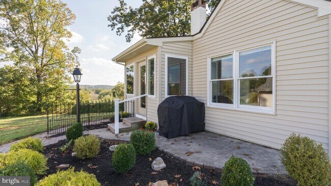 Side entrance, grill not included with house - 1050 N Milford Rd