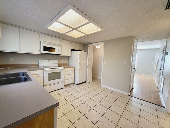 Building Photo - Introducing a charming 2Bds/1.5Bths. townh...