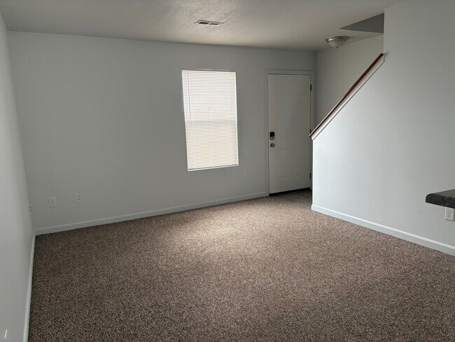 Sala de estar - Candlelight Apartments & Condos