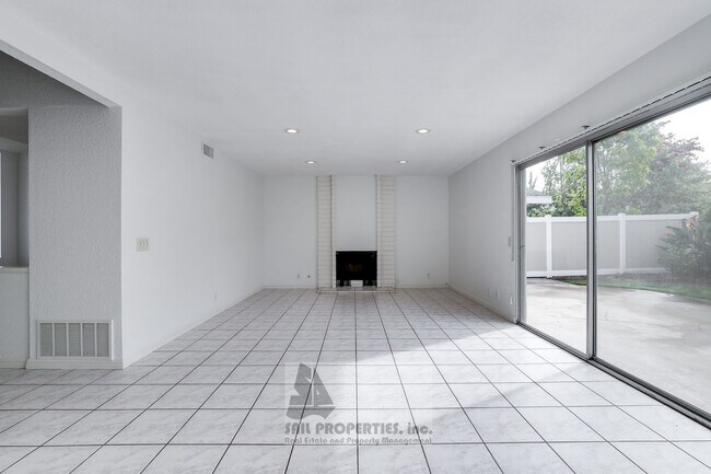Building Photo - 5 Bedrooms. 3-Car Garage. Huntington Beach Charm!