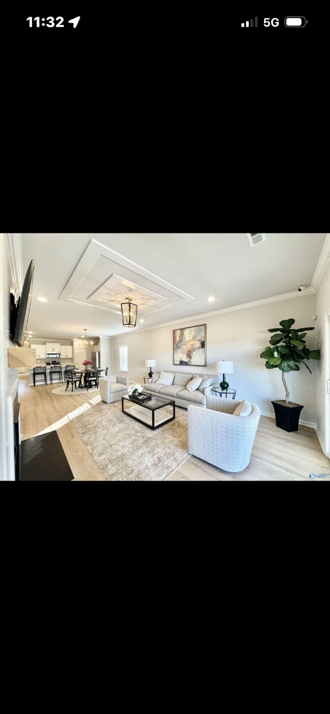 Building Photo - "NEWLY BUILT- Spacious 4-Bedroom Haven with Granite Elegance and Cozy Fireplace in Harvest"