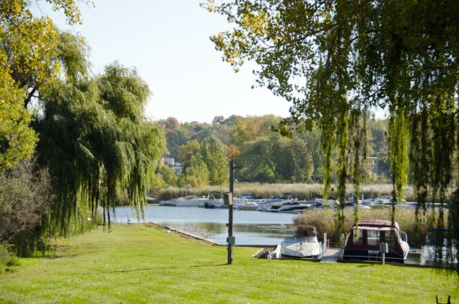 View from resident deck of boatslips and kayak/canoe launch - Harbor District Apartments