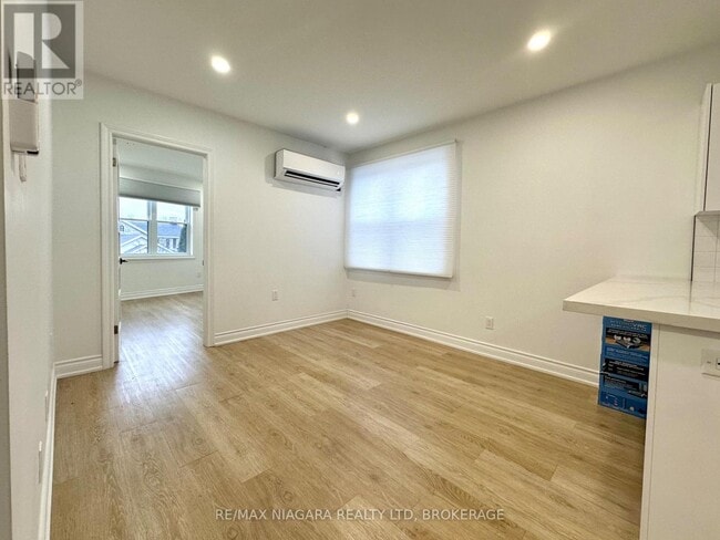 Building Photo - 6065 Main St