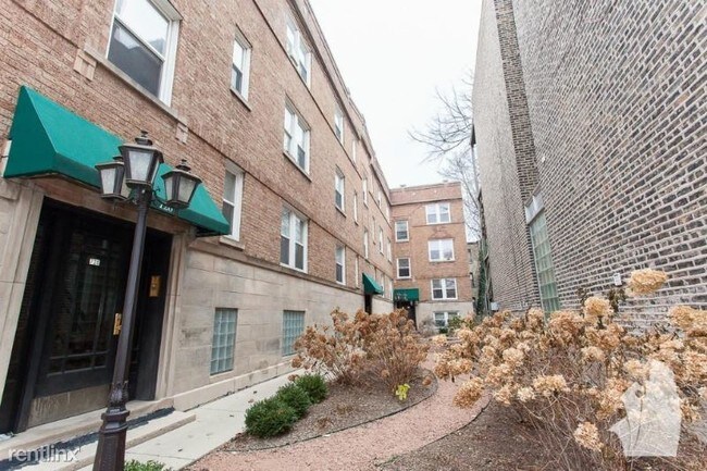 Building Photo - 717 W Barry Ave