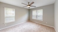 Located at 1523 Roswell Rd in Marietta, GA, this one-bedroom, one-bathroom unit offers a well-designed single-floor layout that maximizes every square foot. The open-concept living area flows seamlessly into a fully equipped kitchen, which features sleek gray shaker cabinets, granite countertops with a classic subway tile backsplash, stainless steel appliances including a refrigerator, range, and dishwasher, and durable light wood-tone luxury vinyl plank flooring. A peninsula with a double sink adds both function and style to the kitchen space.

The spacious bedroom is finished with soft neutral carpet, multiple windows dressed with white blinds that invite natural light, and a modern ceiling fan with an integrated light fixture. The room offers ample space and includes direct access to additional storage areas.

The bathroom is appointed with full-height white subway tile surrounding a soaking tub, complemented by a bright window that keeps the space feeling fresh and airy. A dedicated laundry area with washer and dryer hookups, overhead wire shelving, and hard-surface flooring adds everyday convenience. The unit's neutral color palette and consistent modern finishes create a cohesive, move-in-ready living environment.