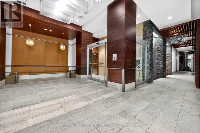 Photo du bâtiment - 330-2330 Burnhamthorpe Rd W