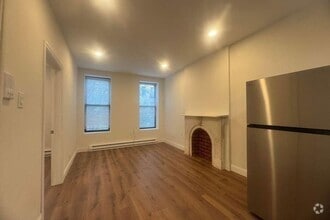 Building Photo - 30 E 127th St