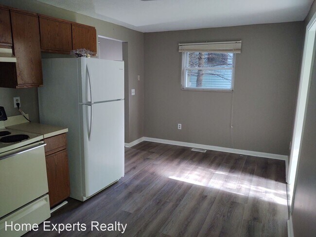 Foto del edificio - 1121-1123 N Lowry Ave