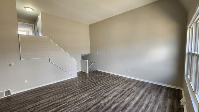 Building Photo - Row home with stainless appliances, centra...