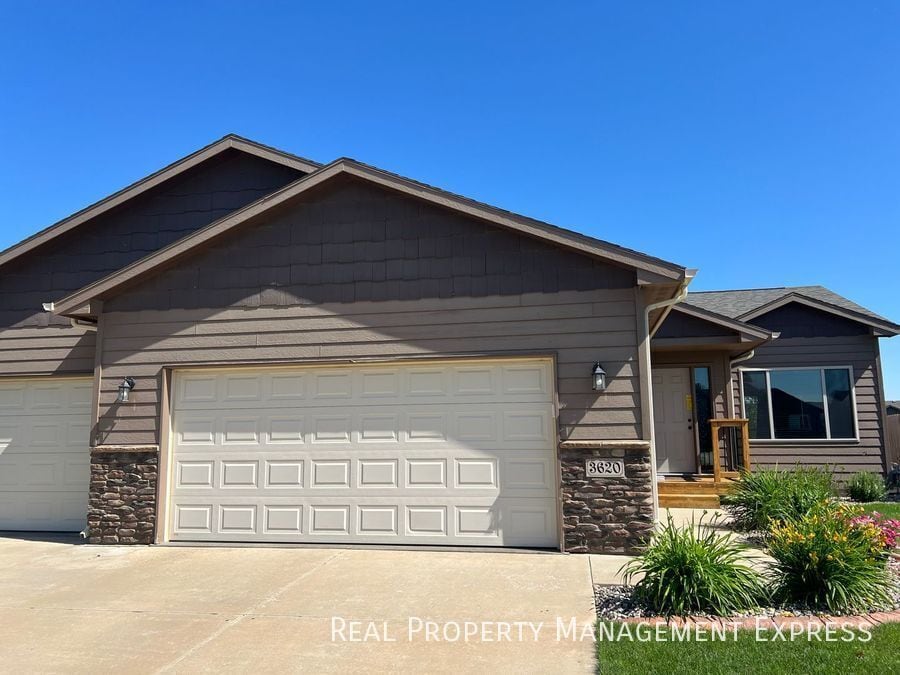 Primary Photo - Spacious 4-Bedroom Home with Open Floor Plan