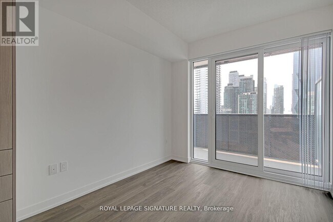 Photo du bâtiment - 55 Cooper St