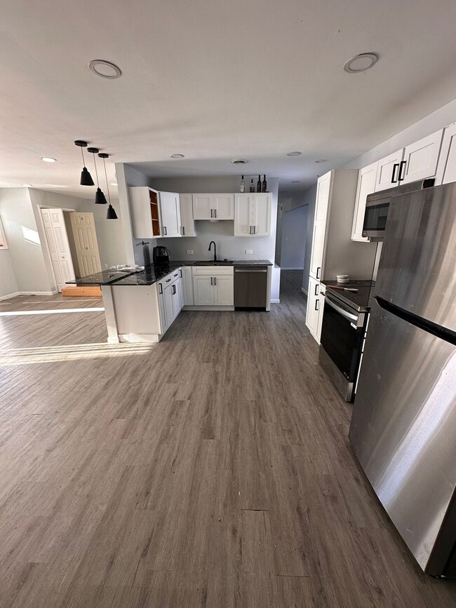 Building Photo - 7927 Rinaldo Blvd N