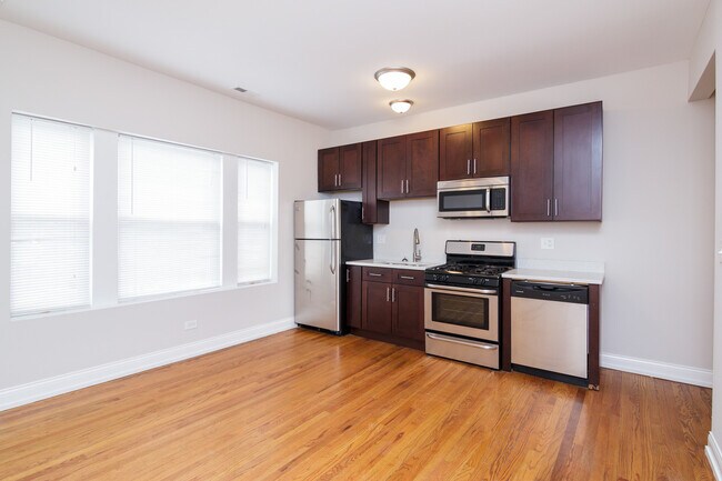Foto del edificio - 4909 W Cuyler Ave