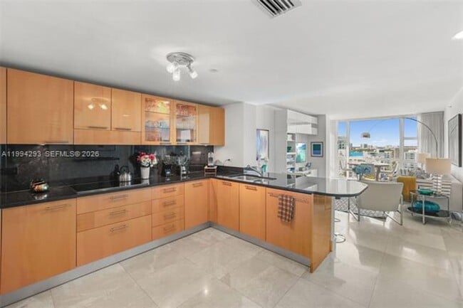 Photo - 6801 Collins Ave Apartment