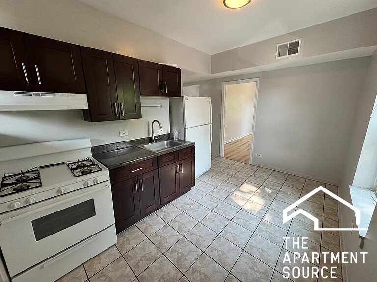 Photo - 3807 W Thomas St (Chicago, IL)