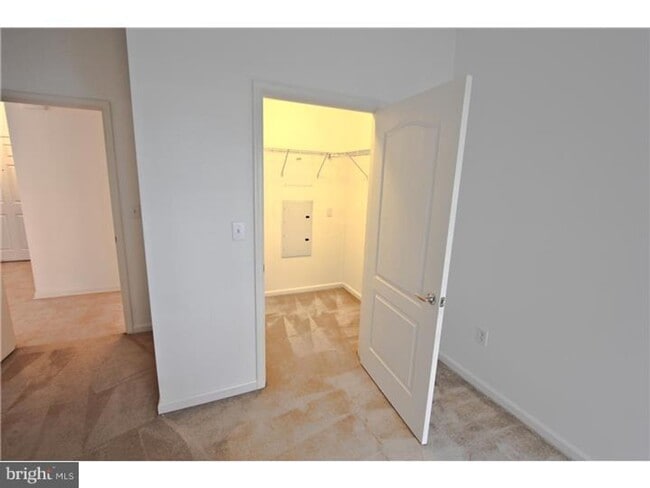 Building Photo - Modern 1 Bed Condo at The Grande | Garage Parking + Resort Amenities | Walk to Fayette St