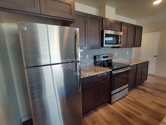 Foto del edificio - 5748 W Albany Pl