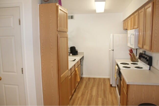 Photo - 10784 W 63rd Pl Townhome