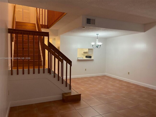 Building Photo - 10030 Hammocks Blvd