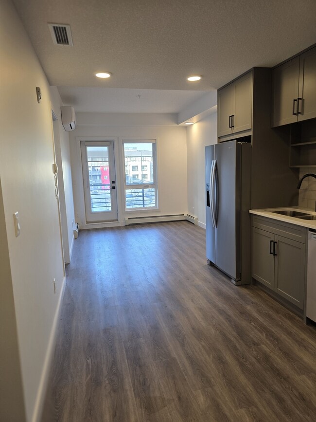 Building Photo - 350-3350 Livingston Common NE