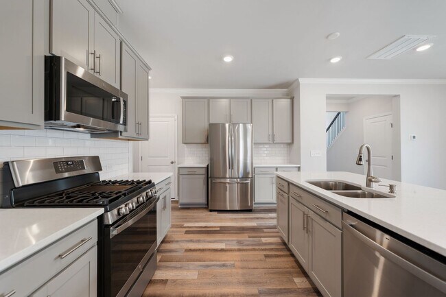Building Photo - Available Now! Newly built 4 bedroom home ...