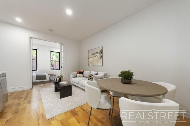 Building Photo - STUNNING 4+ BED 3 BATH DUPLEX + YARD IN PRIME BUSHWICK TOWNHOUSE