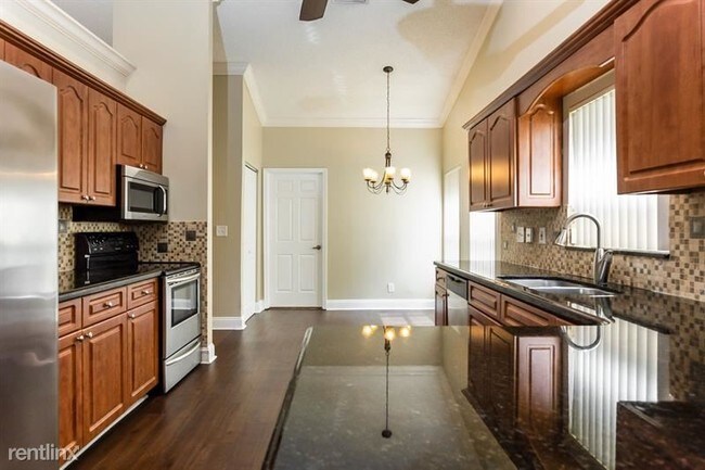 Building Photo - 4 br, 2.5 bath House - 9544 NW 48th Mnr