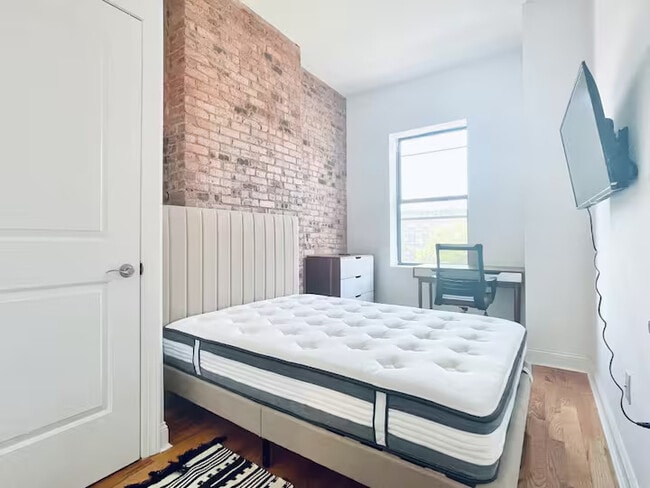 Photo - Central AC, washer/dryer, Exposed Brick Room #214 Apartment