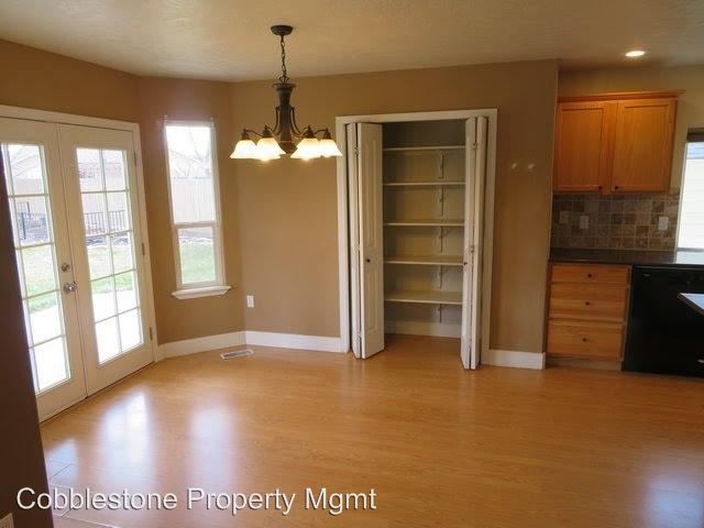 Building Photo - 4 br, 2.5 bath House - 203 E. Cornell Dr.