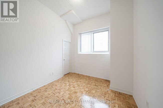 Photo du bâtiment - 1401 Dupont St
