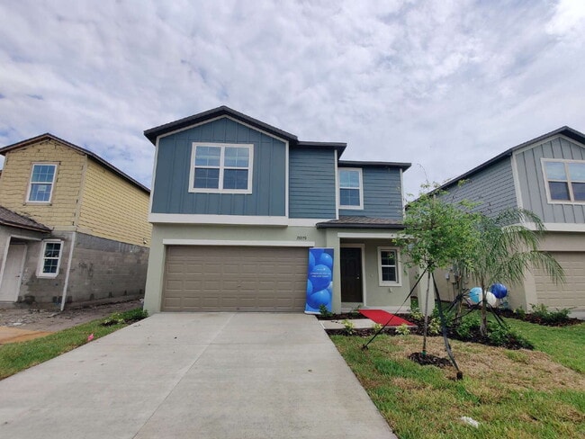 Foto del edificio - Spacious 5-Bedroom Home with First-Floor Owner's Suite in Land O' Lakes