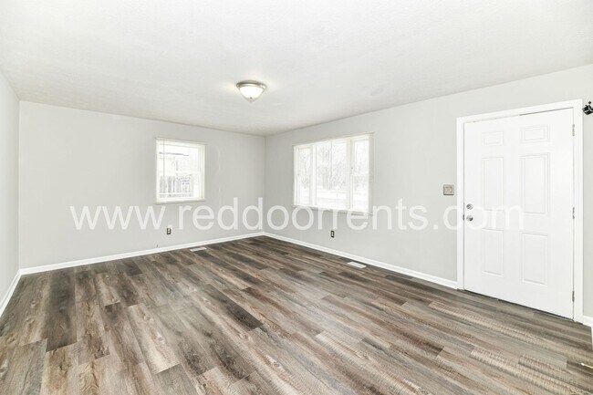 Foto del edificio - Charming 3-Bed Bungalow: Your Perfect Retr...