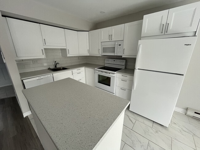 Building Photo - NEWLY RENOVATED TWO BEDROOM SEMI-DETACHED ...