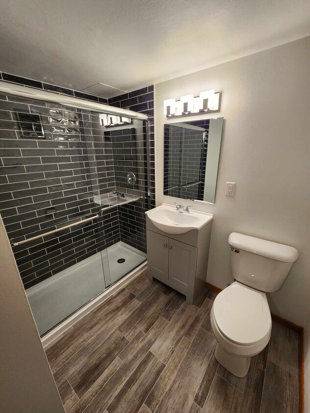 New walk in shower - Madison Square Apartments