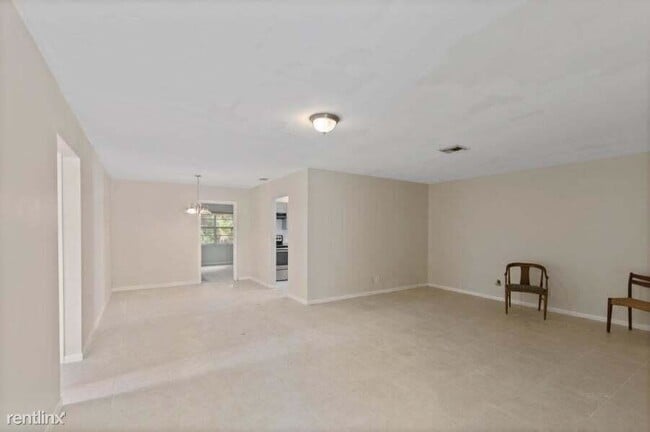 Building Photo - 3 br, 2 bath House - 7186 Pine Bluff Dr 1
