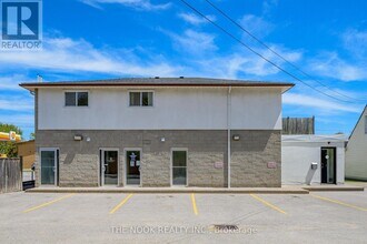 Building Photo - 948 Simcoe St N