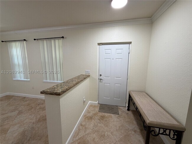Foto del edificio - 6956 W Sample Rd