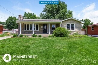 Building Photo - 8003 Canna Dr